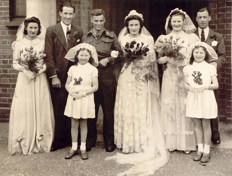 1940s Canadian War Bride wedding -War Bride Rose Boulay and her husband Horace Boulay of Belledune, New Brunswick. Stunning 1940s wedding dress and 1940s bridesmaid dresses. 
