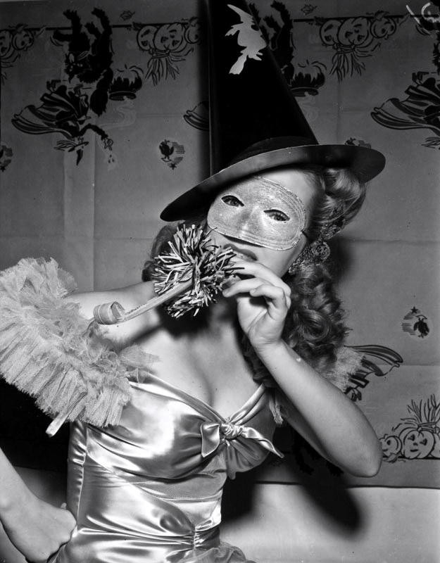 1940s vintage photo of a halloween hollywood reveler, carol winter