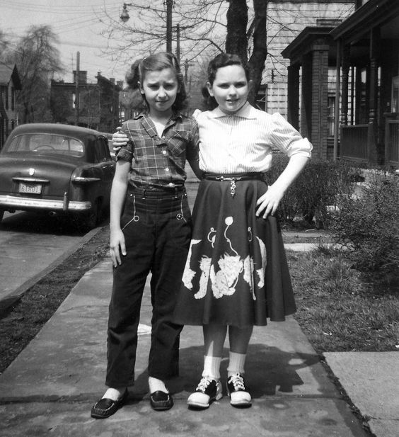 1950s Vintage Photp: Kids in Saddle shoes and jeans and poodle skirts