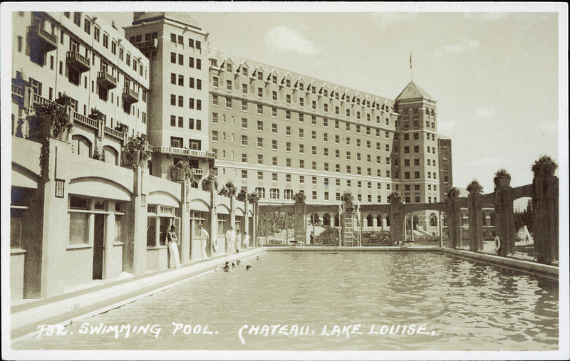 Outdoor swimming pool at the Chateau Lake Louise with swimmers 1930s vintage image