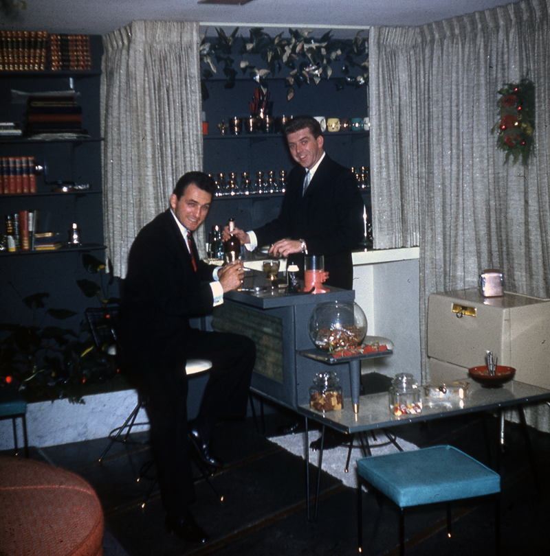 1958 Cocktail Party -) was the bell captain at the Sands Hotel and Casino back in the 1950's and 60's. This was taken at his Christmas Party around 1958. See how the 2 men are dressed in nice suits. Perfect Cocktail Party attire. 