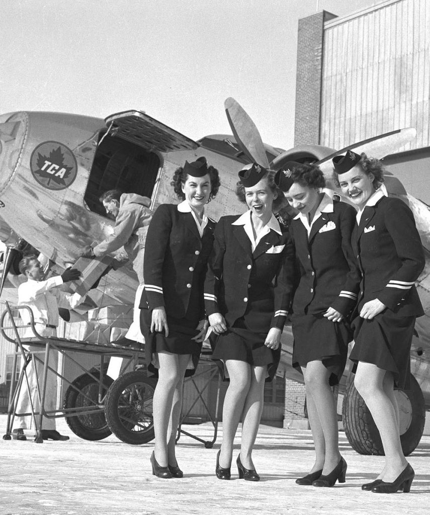 1940s Vintage Photo of Air Canada (TCA) Flight Attendants in 1946 being excited about nylons coming back. 