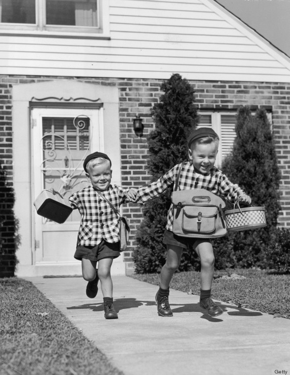 1950s Back to School Image of 2 boys with backpacks image via Getty Images