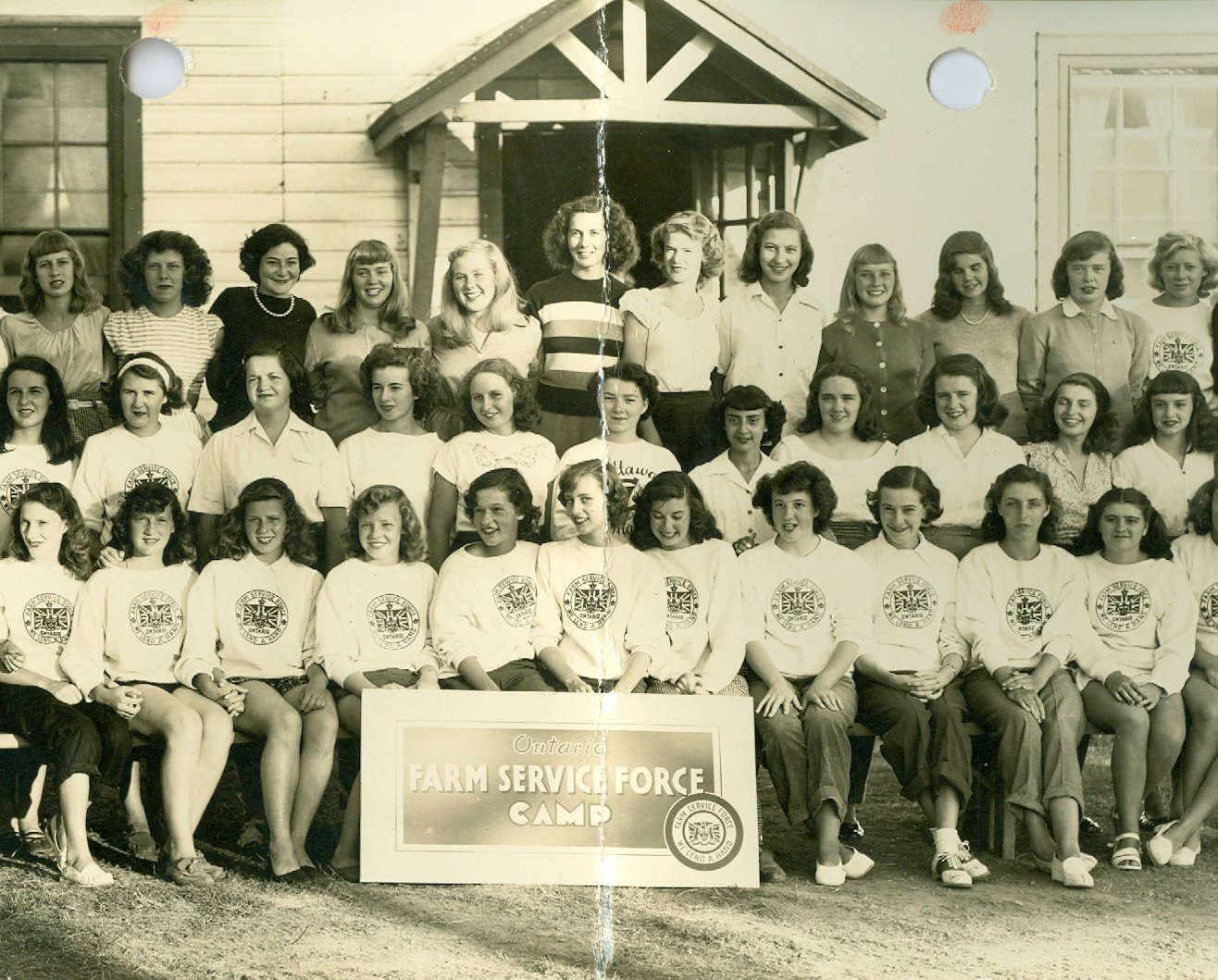 1940s Vintage Photo of young women in Ontario Canada called 'The Farmerettes' at their farming camp in Huttonville. These women helped provide food for the soldiers during WW2. 