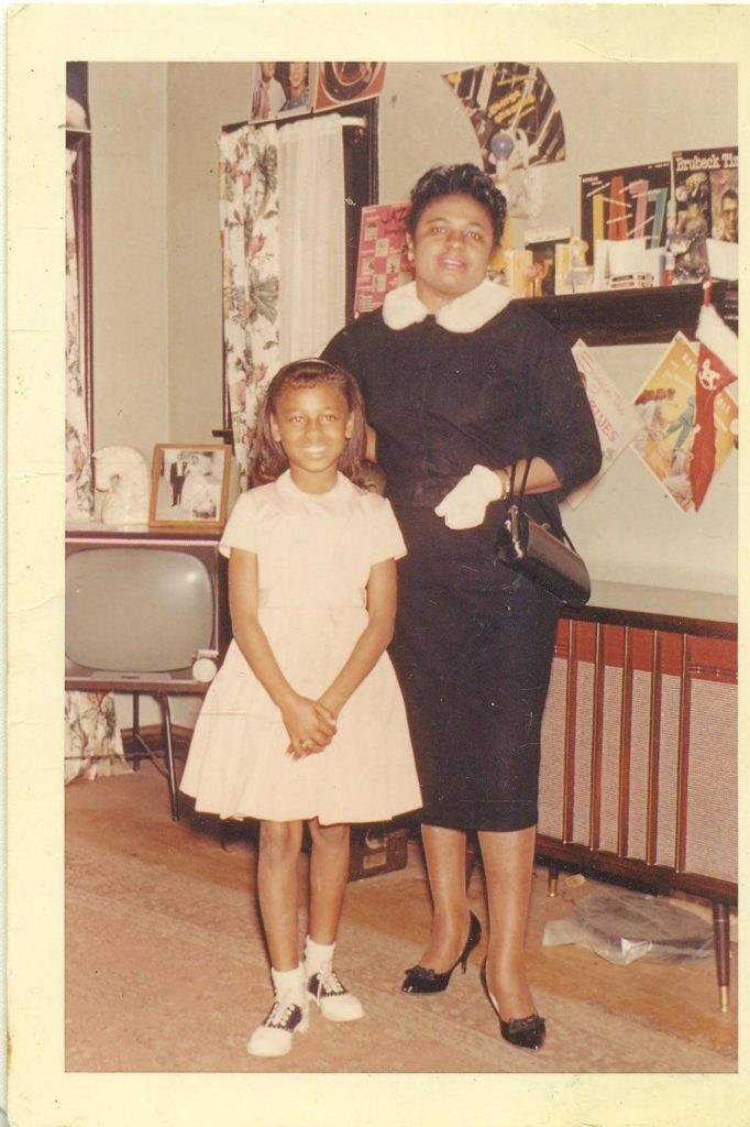 1960s black mother and daughter wearing saddle shoes vintage photo