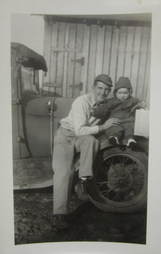 1920s Vintage Photograph of a Father and his Young Daughter Sitting on Fender Antique Car Automobile 1920s