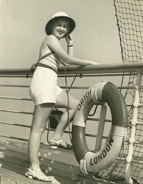 1935 Photo of a women in 1930s summer fashion on the deck of a cruise ship