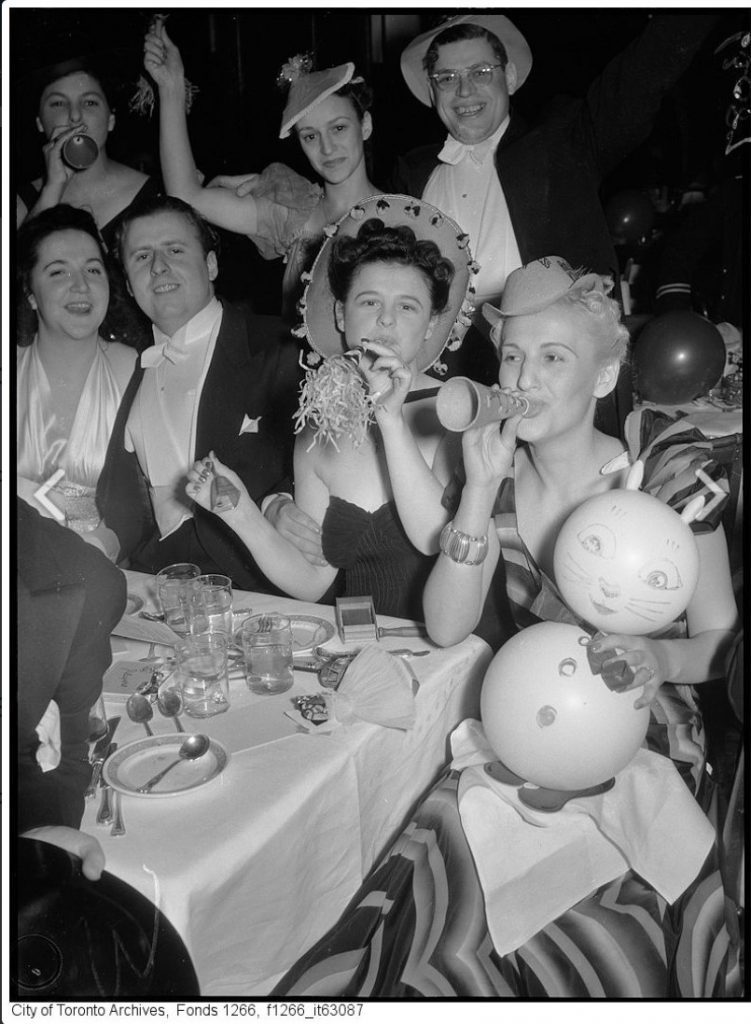 1930s Vintage Photo: 1939 vintage photo of New Years Eve Party. New Year's Eve at King Edward hotel, Mrs. Ruth Gans, Mrs Alec Sherman, London. Super 1930s Fashions and 1930s Hairstyles