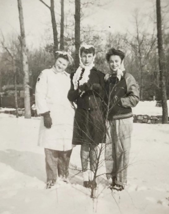 1940s vintage photo of 3 women in the snow wearing 1940s winter fashions and 1940s hairscarfs