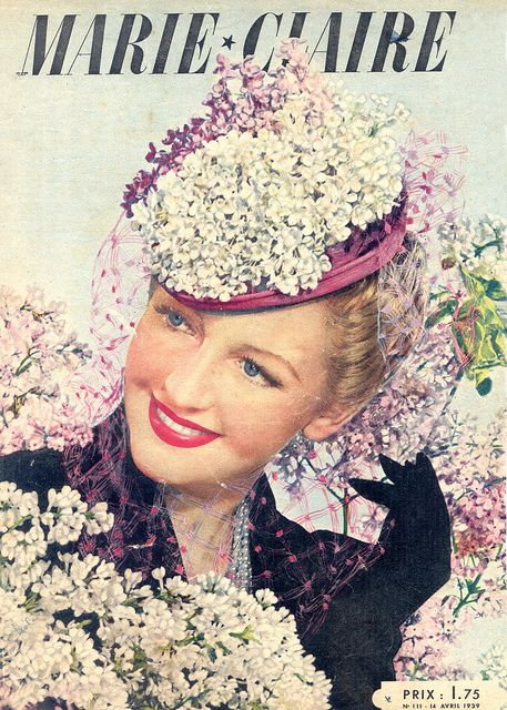 1930s Vintage Magazine-Easter / Spring Cover. Marie Claire April 1939 magazine cover featuring a woman surrounded by flowers and wearing a 1930s vintage hat Easter Bonnet