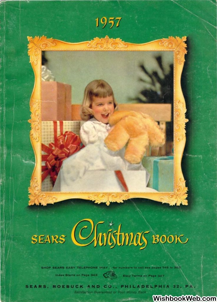 1957 Sears Christmas Book featuring a little girl holding a teddy bear on the cover. 1950s vintage catalog. 