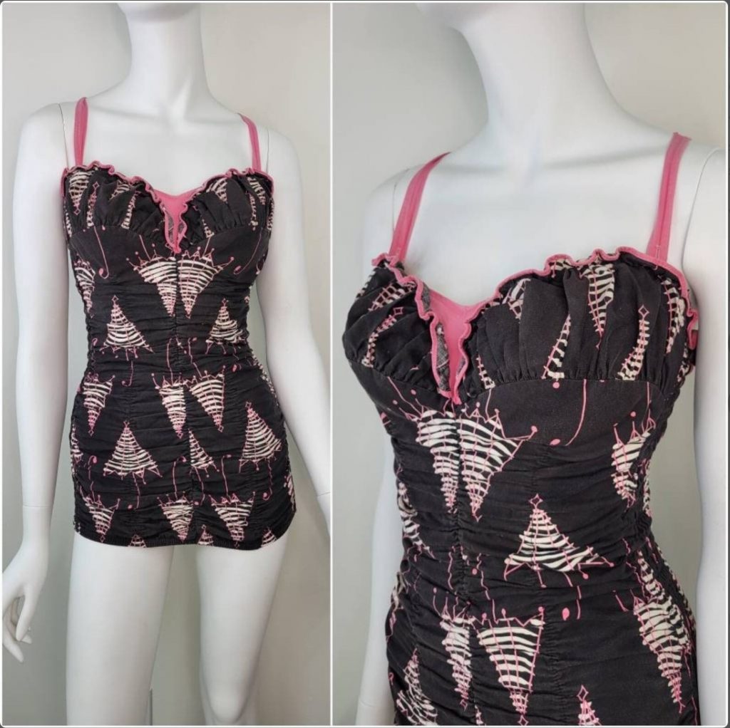 1950s Fashion: 1950s Vintage swimsuit from Catalina Swimwear featuring umbrella's on the fabric. 