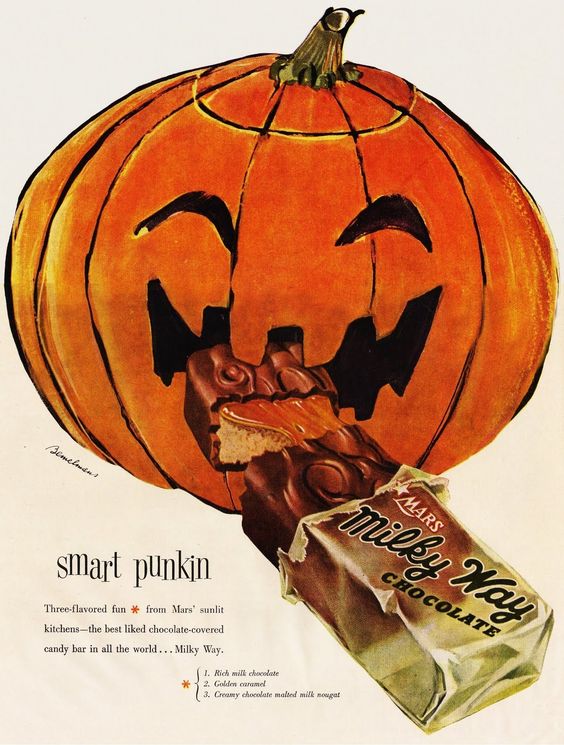 Vintage Milky Way Chocolate bar hallween advertisement. The vintage ad features a pumpkin "Smart pumpkin" eating a chocolate bar.