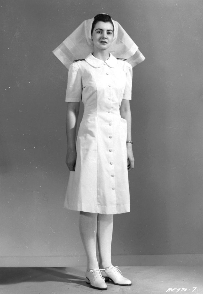 1940s vintage photo of a Canadian Nursing Sister, RCAF (Royal Canadian Air Force), white uniform, 18 Dec 1943.