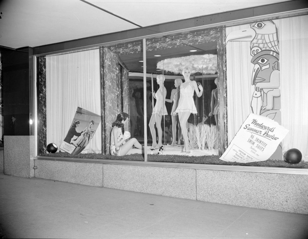 1940s vintage photo of a Woodward's department store window display of women's 1940s swimsuits from 1946
