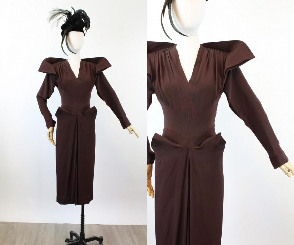 1940s Fashion: Dorothy O'Hara 1940s Dress with  peaked shoulders, deep brownish aubergine rayon draped skirt.