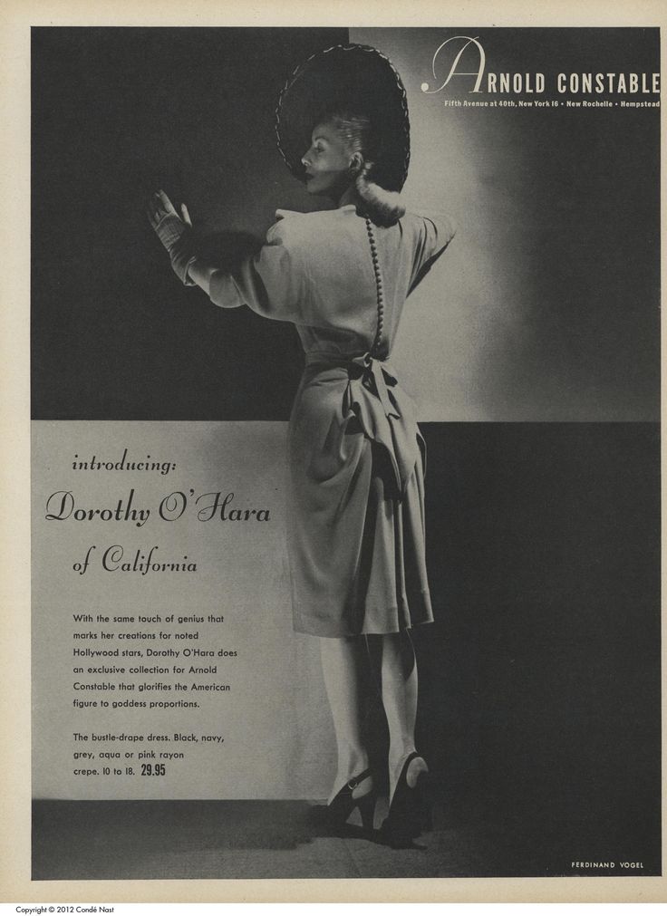 1940s Fashion / 1940s Advertisement: 1940s Advertisement for 'Arnold Constable' featuring an exclusive collection for Dorothy O'Hara for the department store featuring the Bustle-drape dress. 
