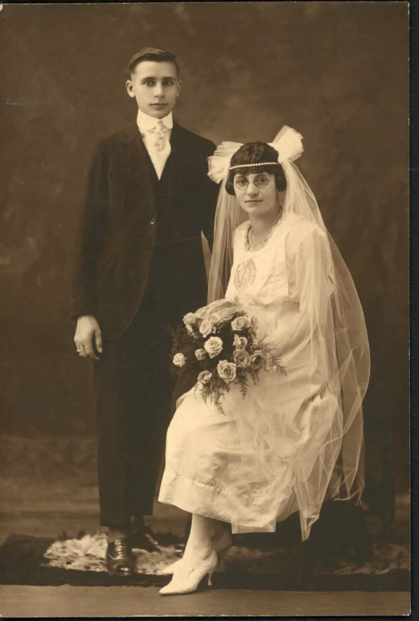 1920s Vintage Photo of a 1920s Bride and Groom posing for their wedding photo. Beautiful vintage wedding 1920s inspiration. 