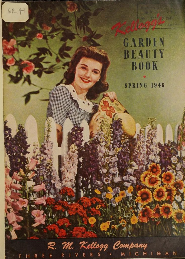 1940s vintage Garden Catalog from 1946 featuring a 1940s woman with a 1940s hairstyle posing in front of a white picket fence with a flower garden in front.