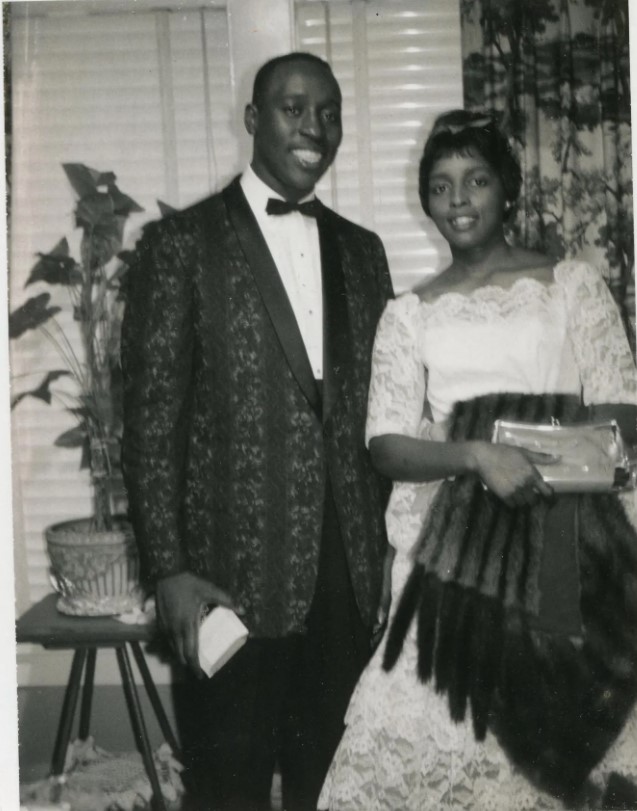 1960s vintage photo of a Black man and Black women heading to the church