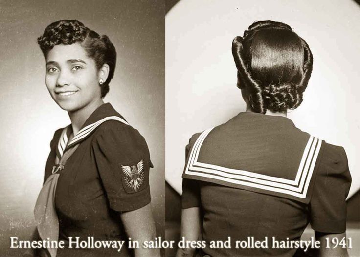 1940s vintage photo of a young Black woman in a sailor dress and a 1940s hairstyle (rolled hairstyle) in 1941. 