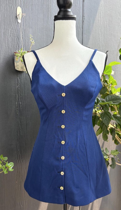 1950s Fashion: 1960s Blue skirted one piece swimsuit from Cole of California. 