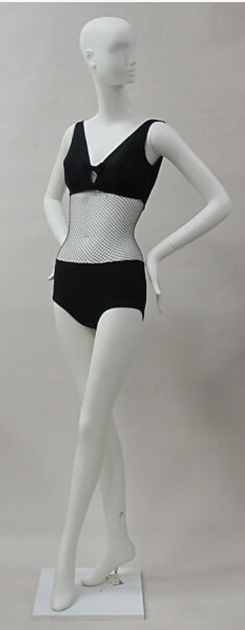 1960s Vintage Swimsuit-The 1954 Cole of California "Scandal" Bathing Suit. named for its provocative exposure of the body through panels of nylon mesh. Margit Fellegi designed the suits using a process she developed for shirring cotton on elastic thread. According to Fellegi, the innovative fabric provided the figure control and fit of a girdle. This suit from the “Scandal” collection, named the “Outrageous,” features a bra top and hipster brief joined by a black mesh insert at the midriff.