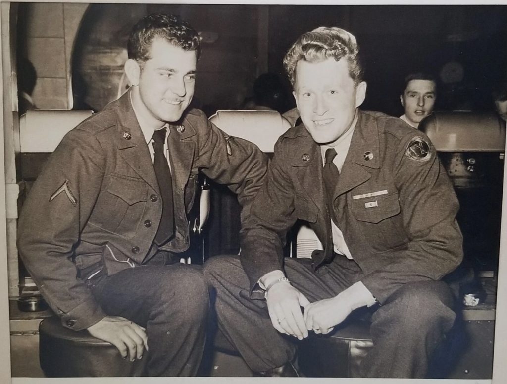 1950s vintage photo of two solider posing together at the Rocker Four Nightclub in Tokyo Japan. 